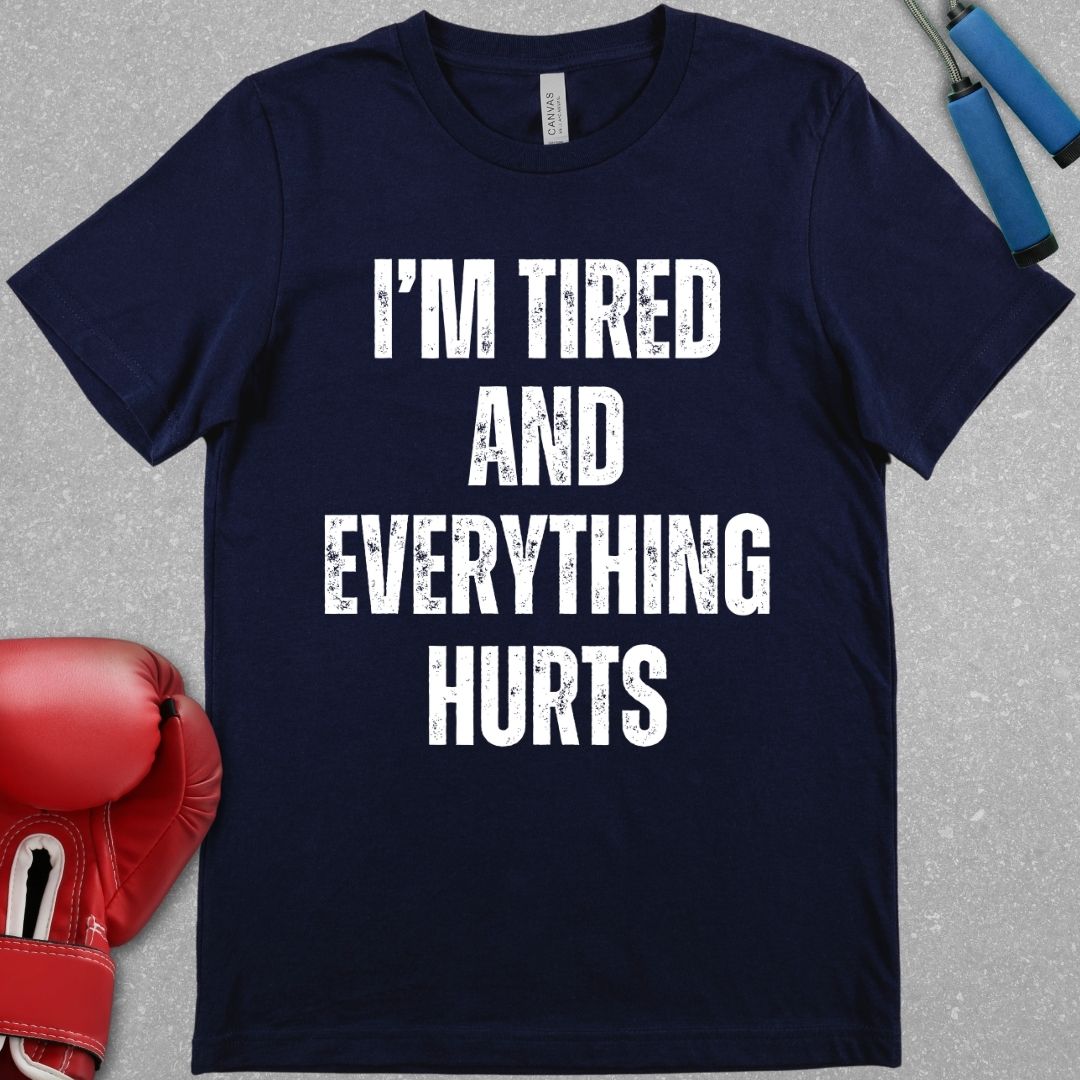 Navy shirt with a design that says I’m tired and everything hurts