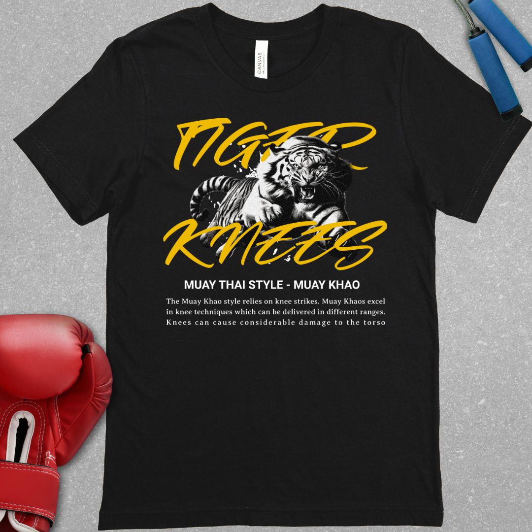Black shirt with a design that has a tiger and says Tiger Knees. There is also text explaining the Muay Khao style of Muay Thai