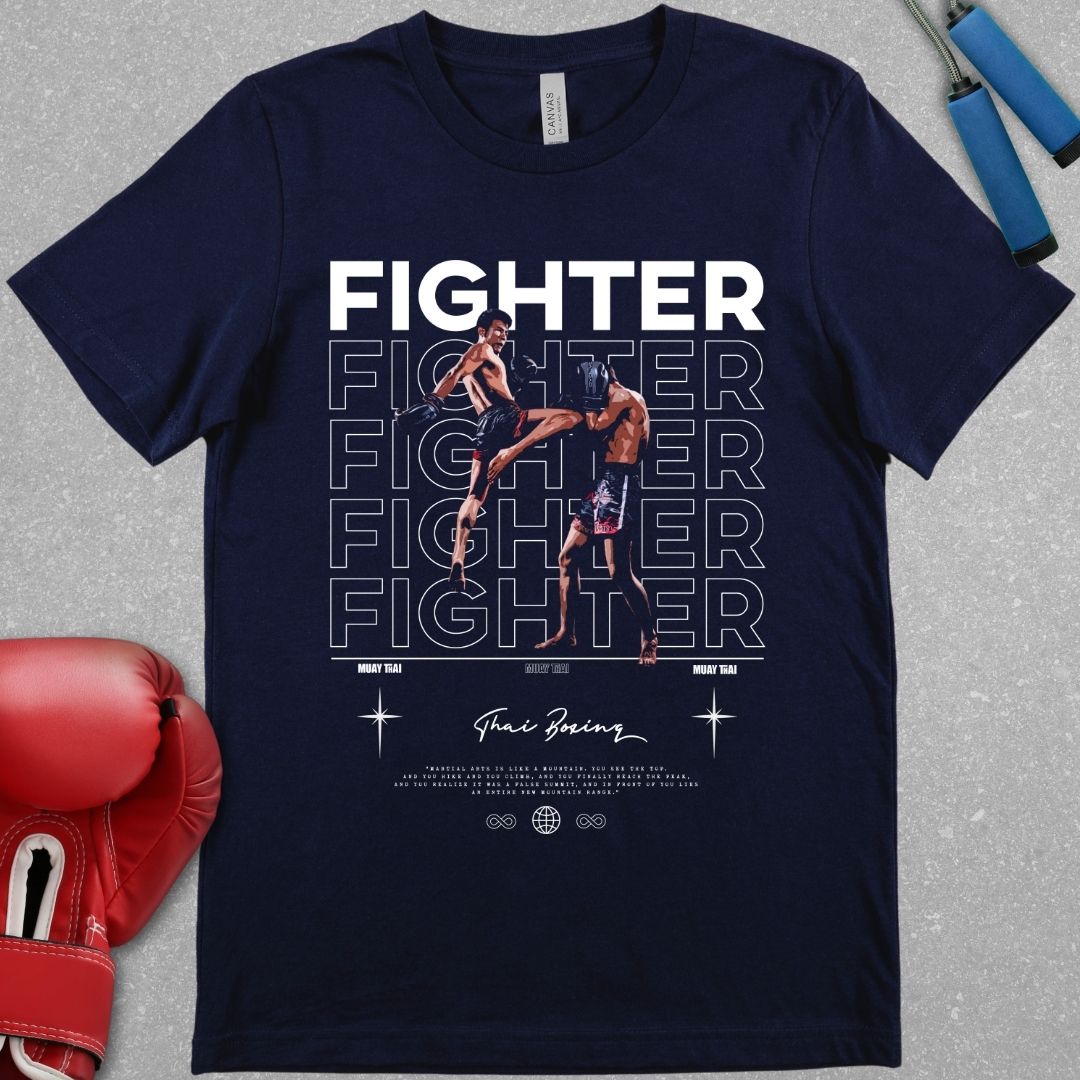 Navy shirt with a design of a Muay Thai fighter throwing a knee to another Muay Thai fighter. The word fighter is highlighted on the shirt and the words Thai Boxing are also on the shirt underneath the picture of the Muay Thai fighters.