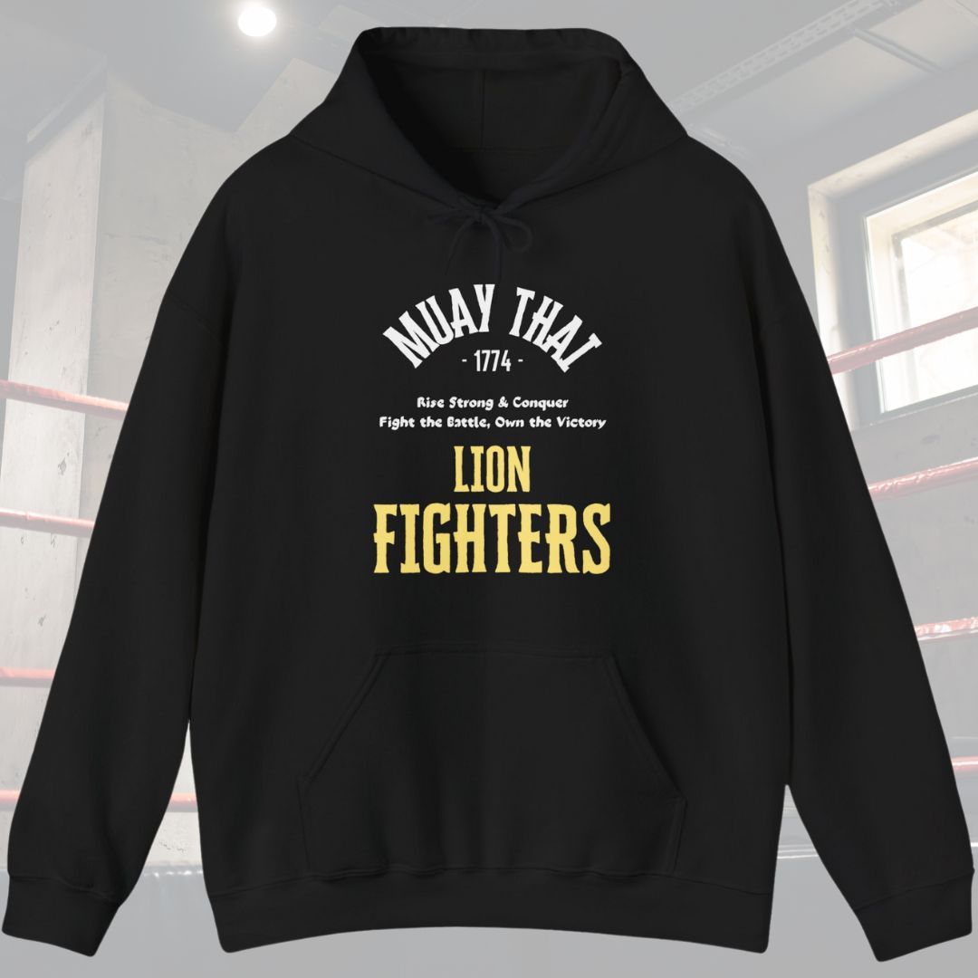 Black hoodie with typography design. Has the words Muay Thai at top of design with the following phrase in the middle Rise Strong and Conquer, Fight the battle, Own the Victory . Also has the words Lion Fighters at the bottom of the design
