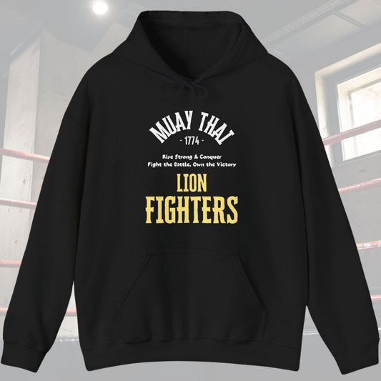 Black hoodie with typography design. Has the words Muay Thai at top of design with the following phrase in the middle Rise Strong and Conquer, Fight the battle, Own the Victory . Also has the words Lion Fighters at the bottom of the design
