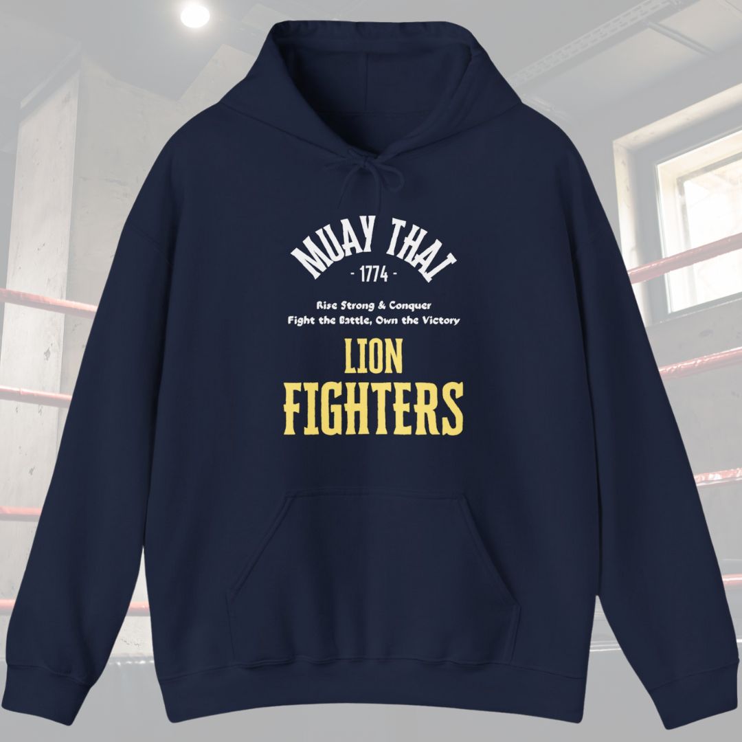 Navy hoodie with typography design. Has the words Muay Thai at top of design with the following phrase in the middle Rise Strong and Conquer, Fight the battle, Own the Victory . Also has the words Lion Fighters at the bottom of the design