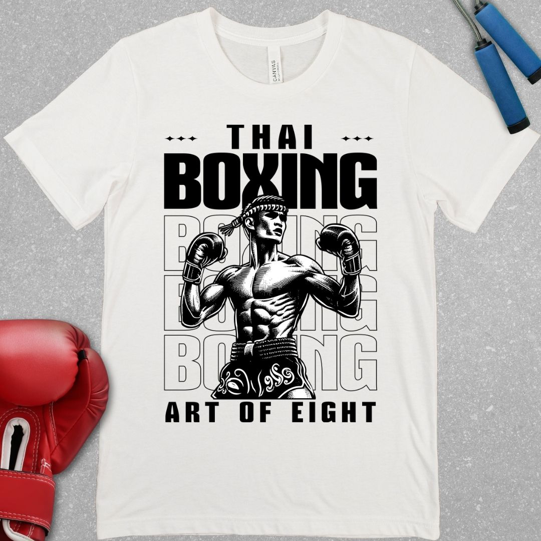 White shirt with a design that has a picture of a muay thai fighter and it says Thai Boxing
