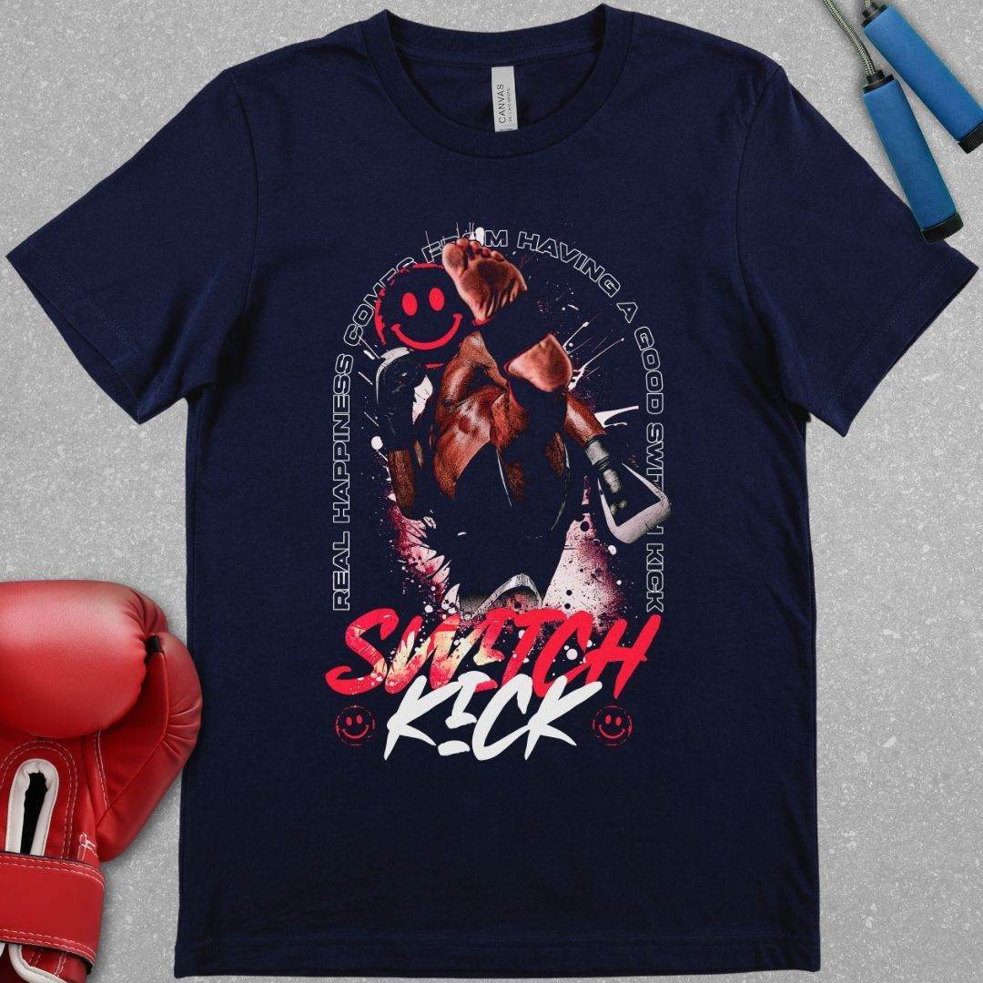 Navy shirt with a design of a Muay Thai fighter throwing a switch kick with a smile on his face and the phrase around the fighter that says Real Happiness Comes From Having A Good Switch Kick.