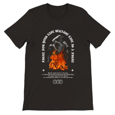 Muay Thai shirt with a design that has a picture of a Muay Boran fighter with fire around him and the phrase Fight for your life cause life is a fight is on the shirt. Also a short description of the definition of Thai boxing is on the shirt