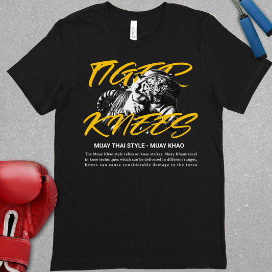 Black shirt with a design that has a tiger and says Tiger Knees. There is also text explaining the Muay Khao style of Muay Thai