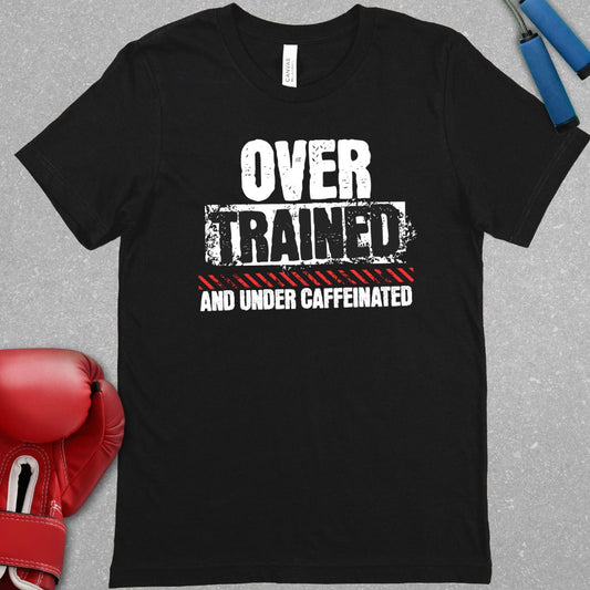 Black shirt with text that says Over Trained And Under Caffeinated