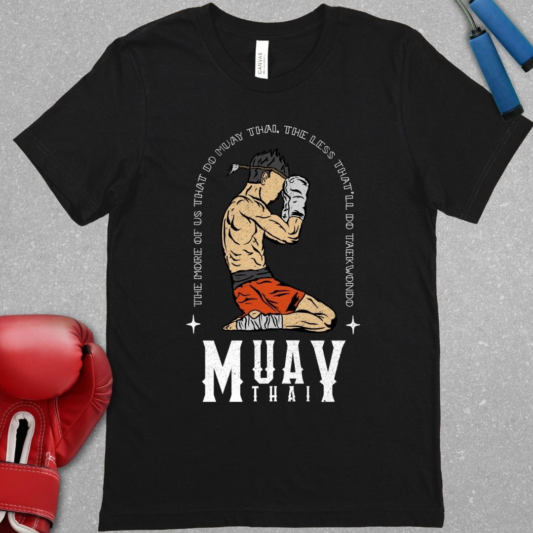 Black shirt that has a design of a Muay Thai fighter in the Wai Khru with the phrase – “The more of us that do Muay Thai, the less that'll do Taekwondo”. The words Muay Thai are also written at the bottom of the design.