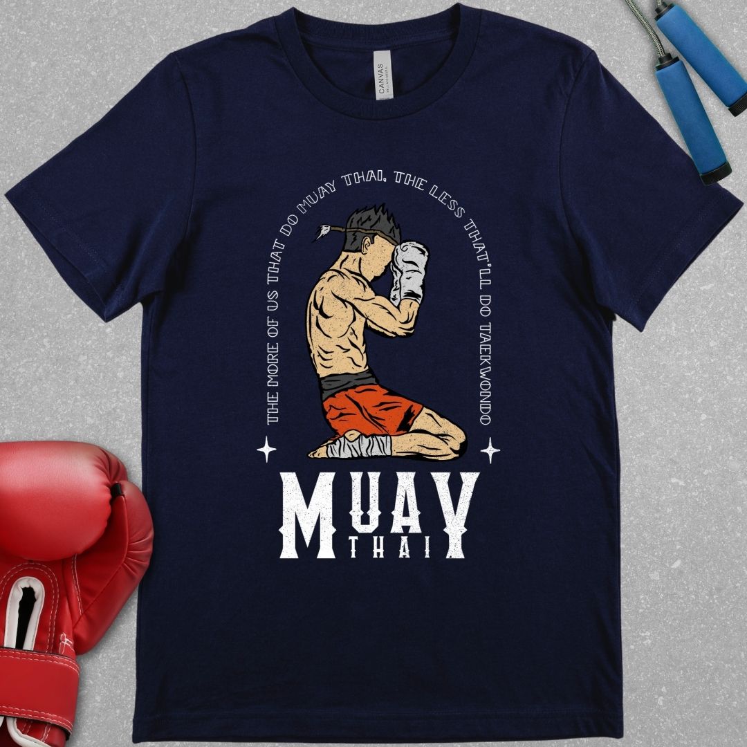 Navy shirt that has a design of a Muay Thai fighter in the Wai Khru with the phrase – “The more of us that do Muay Thai, the less that'll do Taekwondo”. The words Muay Thai are also written at the bottom of the design.